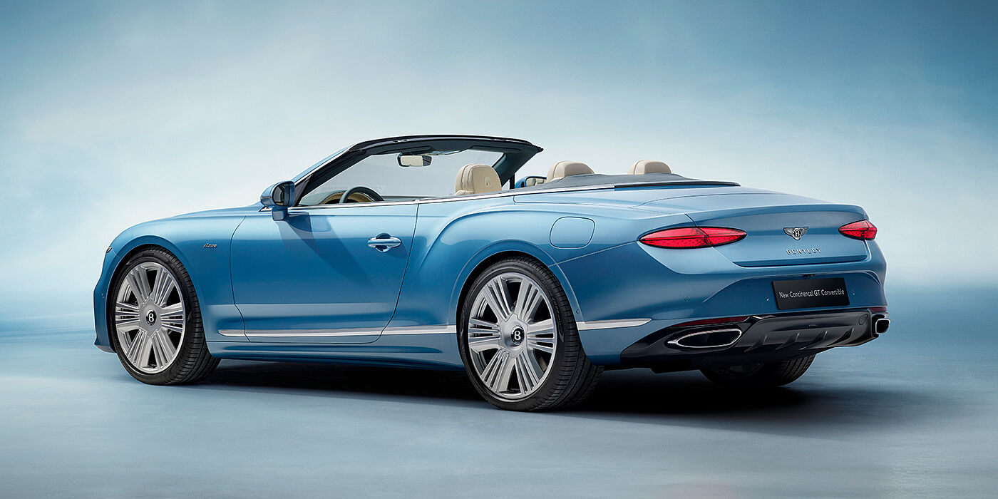Bentley Douglas New Bentley Continental GTC Azure convertible rear view in Light Windsor blue paint with 22 inch ten spoke wheels and chrome exterior details
